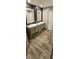 Double vanity bathroom with modern fixtures and large mirrors at 126 Addison Rd, Harleyville, SC 29448