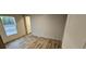 Bright bedroom featuring wood-look floors and window at 126 Addison Rd, Harleyville, SC 29448