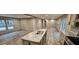 Modern kitchen with island, stainless steel appliances, and wood cabinets at 126 Addison Rd, Harleyville, SC 29448