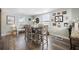 Charming dining area with a table and chairs, and a farmhouse style bench at 1420 Old Whitesville Rd, Moncks Corner, SC 29461