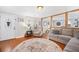 Spacious living room featuring hardwood floors, comfortable seating, and a decorative rug at 1420 Old Whitesville Rd, Moncks Corner, SC 29461