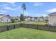 Private backyard with pond view and wooden fence at 1617 Bowsprit Ct, Mount Pleasant, SC 29466