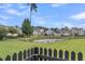 Private backyard with pond view and wooden fence at 1617 Bowsprit Ct, Mount Pleasant, SC 29466