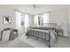 Cozy bedroom with metal bed frame and ample natural light at 1617 Bowsprit Ct, Mount Pleasant, SC 29466
