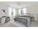 Relaxing bedroom with a metal bed frame, soft rug, and plenty of natural light at 1617 Bowsprit Ct, Mount Pleasant, SC 29466