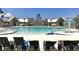 Resort-style pool with lounge chairs and a water feature at 1617 Bowsprit Ct, Mount Pleasant, SC 29466