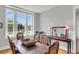Bright dining room features a wood table, four chairs, and large windows at 1617 Bowsprit Ct, Mount Pleasant, SC 29466