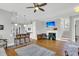 Spacious living area featuring hardwood floors and a fireplace at 1617 Bowsprit Ct, Mount Pleasant, SC 29466