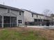 Home with fenced backyard, screened porch, and inground pool at 1708 Indaba Way, Charleston, SC 29414