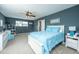This bedroom is furnished with a bed, desk, and nightstand at 1708 Indaba Way, Charleston, SC 29414