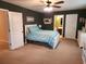 Bright bedroom with ceiling fan and ensuite bath at 1708 Indaba Way, Charleston, SC 29414