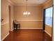 Bright dining room with hardwood floors and a chandelier at 1708 Indaba Way, Charleston, SC 29414