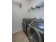 This laundry room features a tile floor and new washer and dryer at 1708 Indaba Way, Charleston, SC 29414