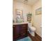 Updated bathroom with glass sink and dark wood vanity at 1915 Marsh Oak Ln, Seabrook Island, SC 29455
