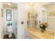 Double vanity bathroom with a walk-in shower at 1915 Marsh Oak Ln, Seabrook Island, SC 29455
