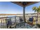 Relaxing screened porch overlooking the marina and waterway at 1915 Marsh Oak Ln, Seabrook Island, SC 29455