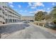Exterior view of two-story building with parking at 2262 Folly Rd # 2-K, Charleston, SC 29412