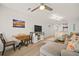 Open concept dining area with a drop leaf table and wood floors at 2262 Folly Rd # 2-K, Charleston, SC 29412