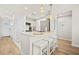 Modern kitchen with white cabinets and island at 2262 Folly Rd # 2-K, Charleston, SC 29412