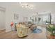 Spacious living area with L-shaped sofa and wood floors at 2262 Folly Rd # 2-K, Charleston, SC 29412