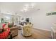 Living room with sectional sofa and access to balcony at 2262 Folly Rd # 2-K, Charleston, SC 29412