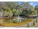 Serene water feature with fountain in landscaped area at 2262 Folly Rd # 2-K, Charleston, SC 29412