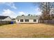 View of home's rear elevation and backyard at 232 Mallory Dr, Charleston, SC 29414