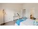Bedroom with hardwood floors, ample natural light, and access to bathroom at 232 Mallory Dr, Charleston, SC 29414