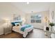 Spacious bedroom with vaulted ceilings, large window, and hardwood floors at 232 Mallory Dr, Charleston, SC 29414