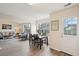 Open concept dining area with hardwood floors and access to the backyard at 232 Mallory Dr, Charleston, SC 29414