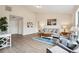 Spacious living room with hardwood floors, large windows, and comfortable seating at 232 Mallory Dr, Charleston, SC 29414
