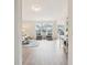 Spacious living room with hardwood floors, large windows, and comfortable seating at 232 Mallory Dr, Charleston, SC 29414