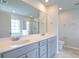 Bathroom with double vanity, large mirror, and separate shower at 238 Wathen Dr, Goose Creek, SC 29445
