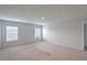 Spacious bedroom with two windows and neutral decor at 238 Wathen Dr, Goose Creek, SC 29445