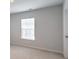 Simple bedroom with window and neutral wall colors at 238 Wathen Dr, Goose Creek, SC 29445
