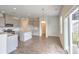 Eat-in kitchen with granite counters, stainless steel appliances, and backyard access at 238 Wathen Dr, Goose Creek, SC 29445