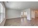 Open concept living room, hardwood floors, access to kitchen and dining areas at 238 Wathen Dr, Goose Creek, SC 29445