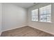 Small office with hardwood floors and two windows at 238 Wathen Dr, Goose Creek, SC 29445