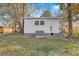 A well-maintained backyard featuring a cozy shed, an efficient AC unit, and lush greenery for outdoor enjoyment at 2664 Hull St, North Charleston, SC 29405