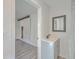 Well-lit bathroom with vanity, framed mirror and access to hallway, shower and view of living area at 2664 Hull St, North Charleston, SC 29405