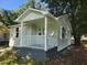 Newly painted light green house with a white porch at 2664 Hull St, North Charleston, SC 29405