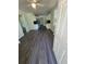 Renovated kitchen with gray flooring and stainless steel appliances at 2664 Hull St, North Charleston, SC 29405