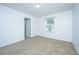 Spacious bedroom with neutral decor and carpet flooring at 275 Jackson St, Goose Creek, SC 29445