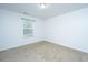 Simple bedroom with neutral walls and carpeted floor at 275 Jackson St, Goose Creek, SC 29445