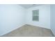 Spacious bedroom with neutral walls, carpet, and a window with blinds at 275 Jackson St, Goose Creek, SC 29445