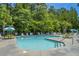 Inviting community pool area with surrounding trees and seating at 275 Jackson St, Goose Creek, SC 29445