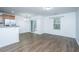 Simple dining room with sliding glass door and hardwood floor at 275 Jackson St, Goose Creek, SC 29445