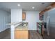 Modern kitchen with stainless steel appliances and granite countertops at 275 Jackson St, Goose Creek, SC 29445