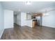 Open kitchen with stainless steel appliances and wood cabinets at 275 Jackson St, Goose Creek, SC 29445