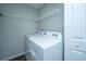 Laundry room with side-by-side washer and dryer and overhead shelving at 275 Jackson St, Goose Creek, SC 29445